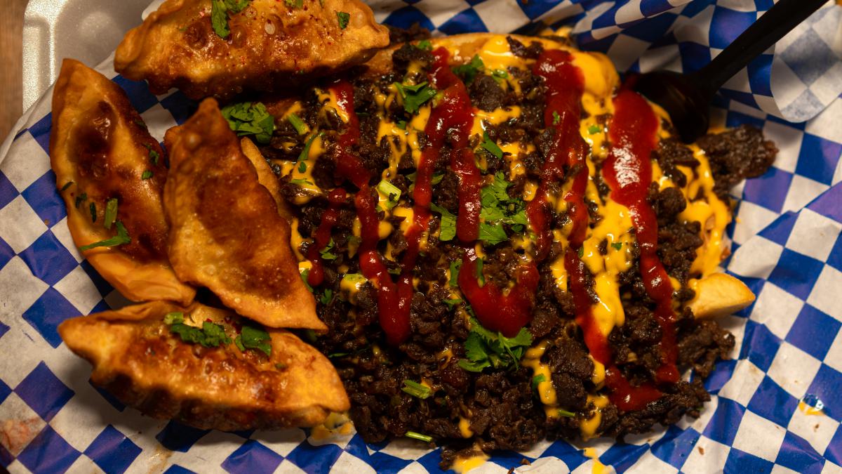 Picture taken from above of fries loaded with Korean Beef from Oh My Gogi.